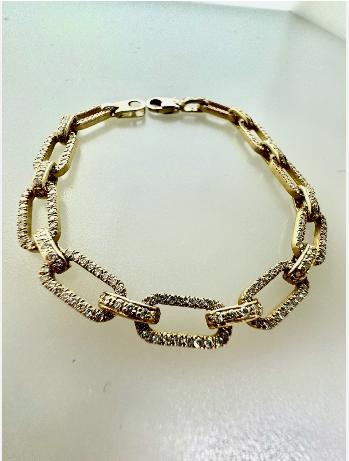 14k Gold Bracelet, Oval Link Filled With Diamonds.